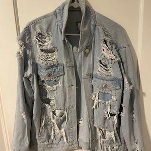 Distressed oversized denim jacket